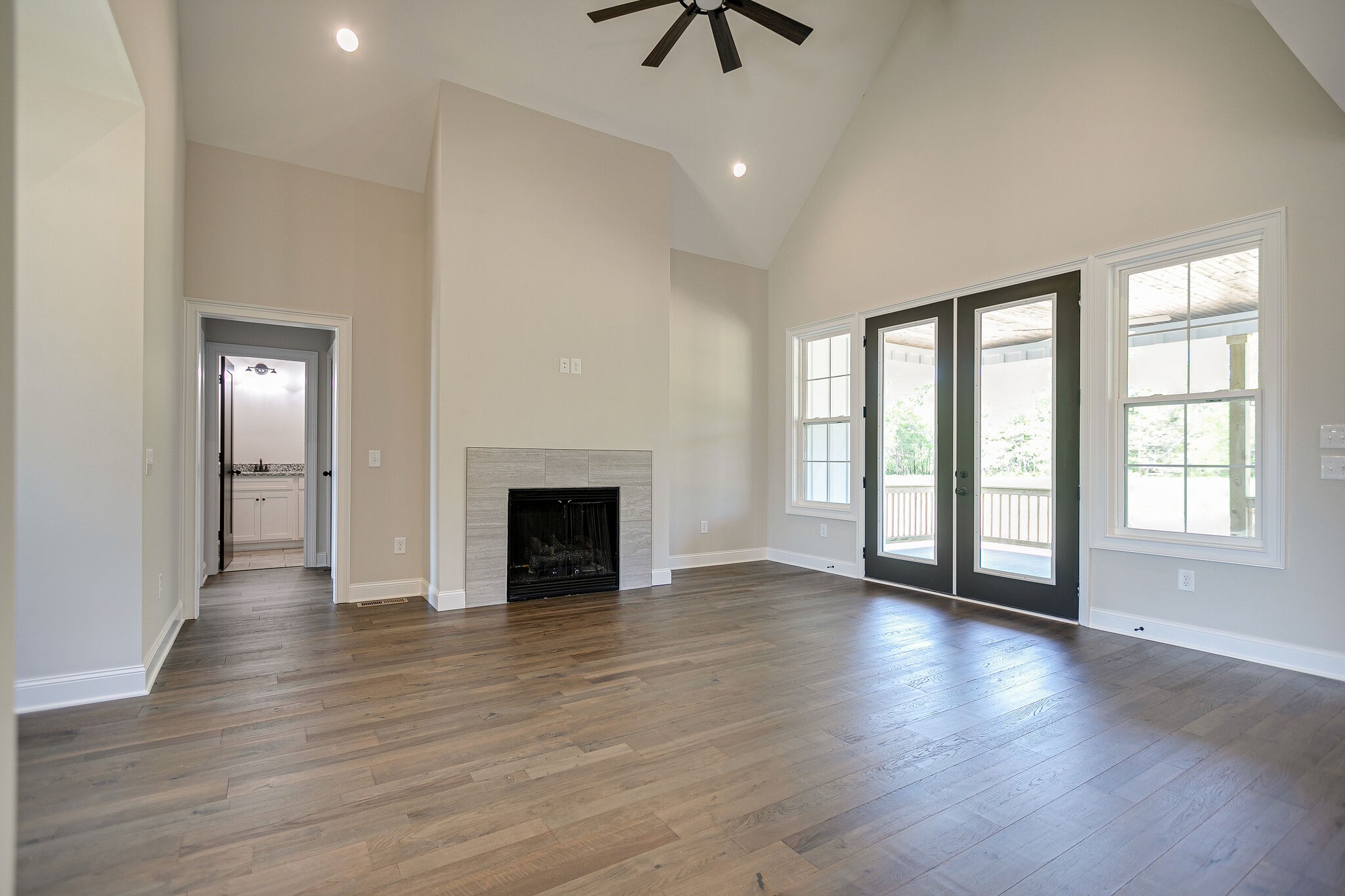 4640 Lunns Store Road Chapel Hill, TN 37034 - Photo 7 of 30 a view of an empty room with wooden floor and a window