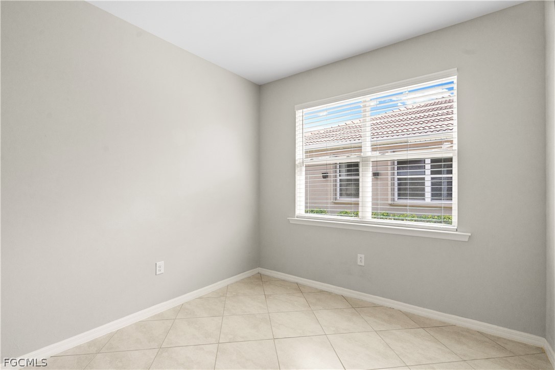 4443 Dutchess Park Road Fort Myers, FL 33916 - Photo 11 of 19 a view of an empty room with a window