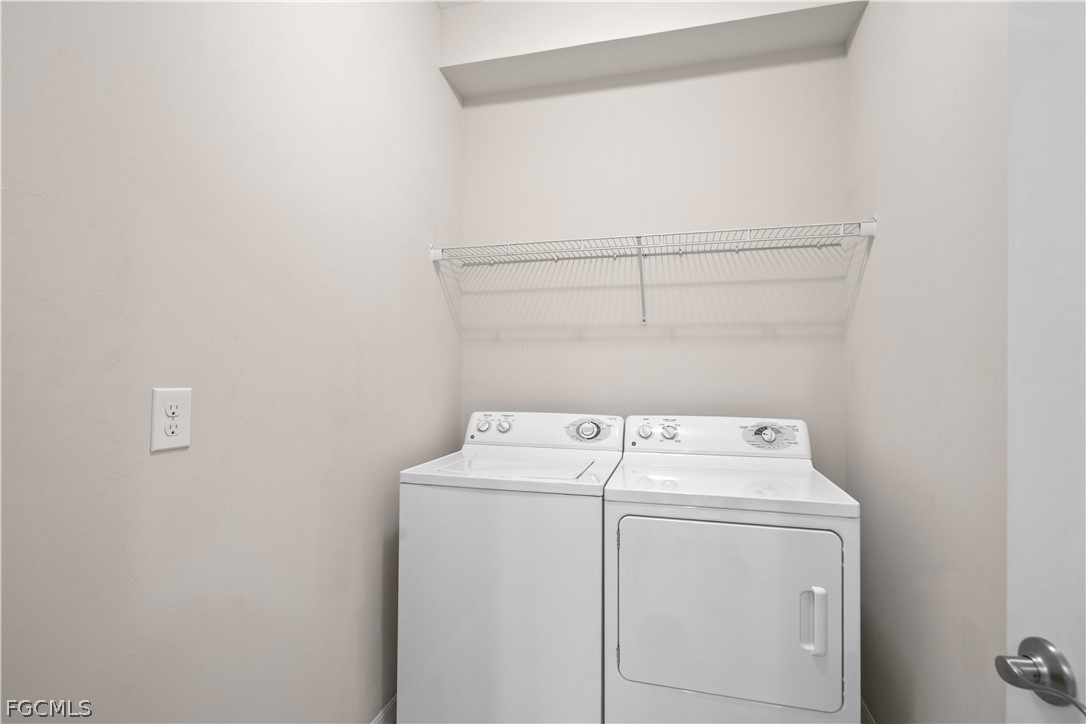 4443 Dutchess Park Road Fort Myers, FL 33916 - Photo 13 of 19 a utility room with dryer and washer