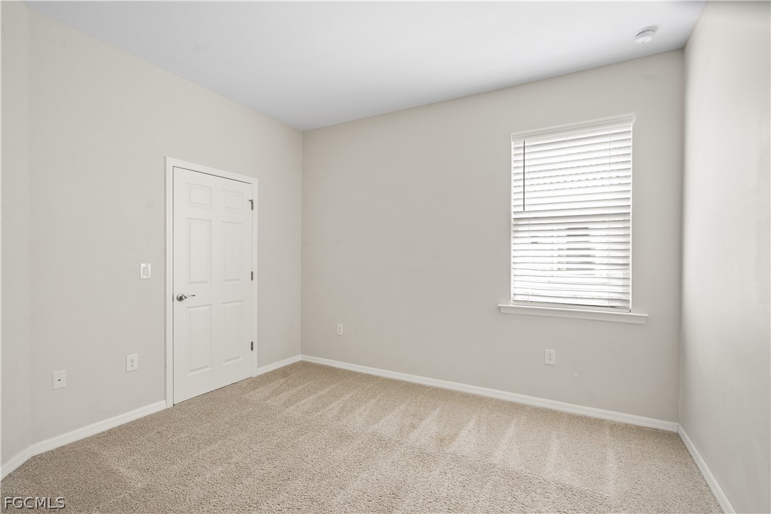 4443 Dutchess Park Road Fort Myers, FL 33916 - Photo 15 of 19 an empty room with a window