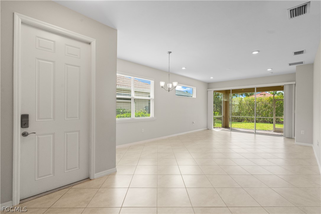 4443 Dutchess Park Road Fort Myers, FL 33916 - Photo 2 of 19 a view of an empty room with a window