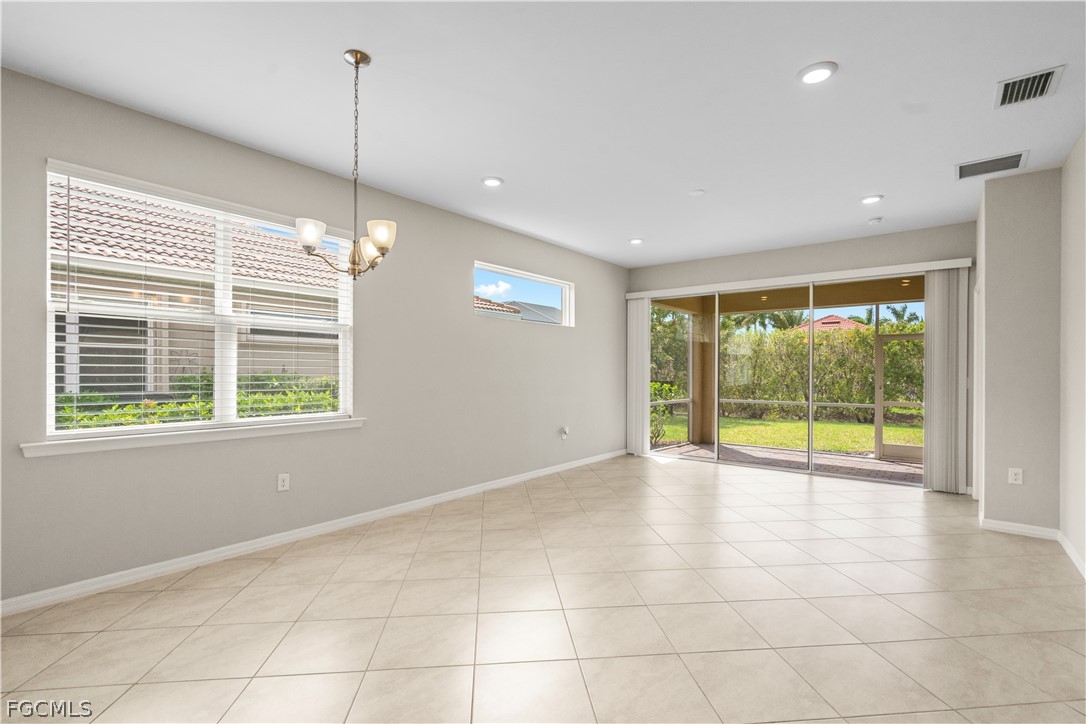 4443 Dutchess Park Road Fort Myers, FL 33916 - Photo 3 of 19 a view of an empty room with a window