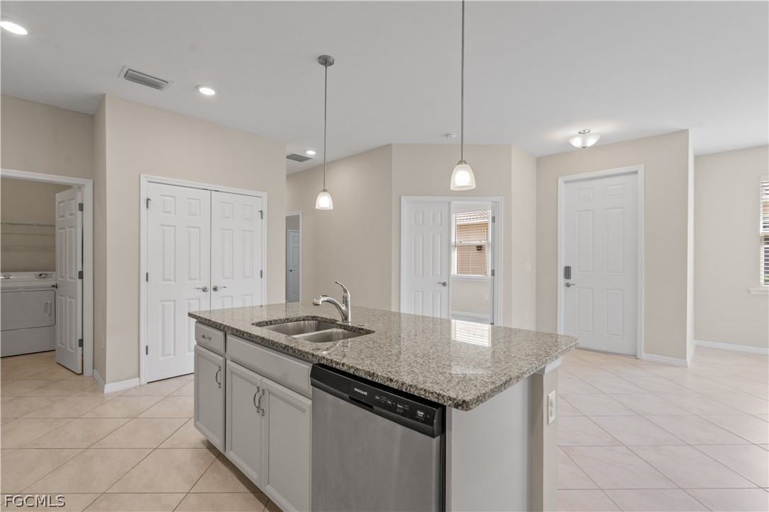 4443 Dutchess Park Road Fort Myers, FL 33916 - Photo 10 of 19 a kitchen with granite countertop a sink cabinets and stainless steel appliances