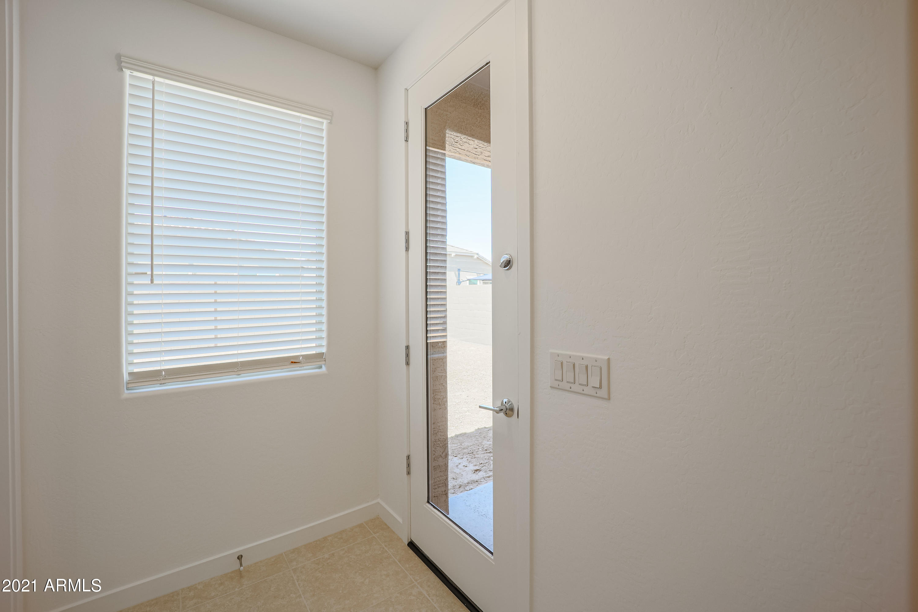 16556 West Alameda Road Surprise, AZ 85387 - Photo 14 of 34 a view of an empty room with window