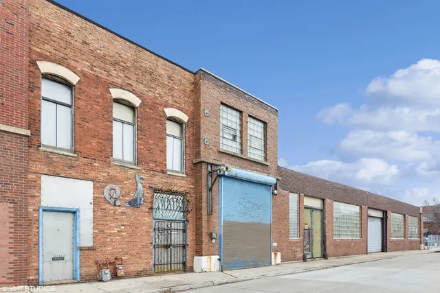 a front view of a house with parking