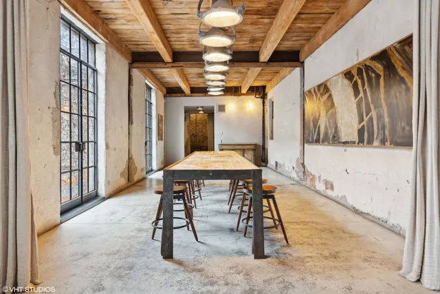 a view of a bathroom with a sink and mirror