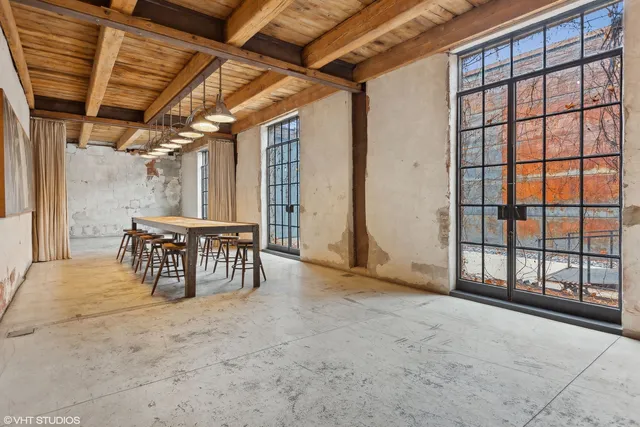 a bathroom with a tub and shower