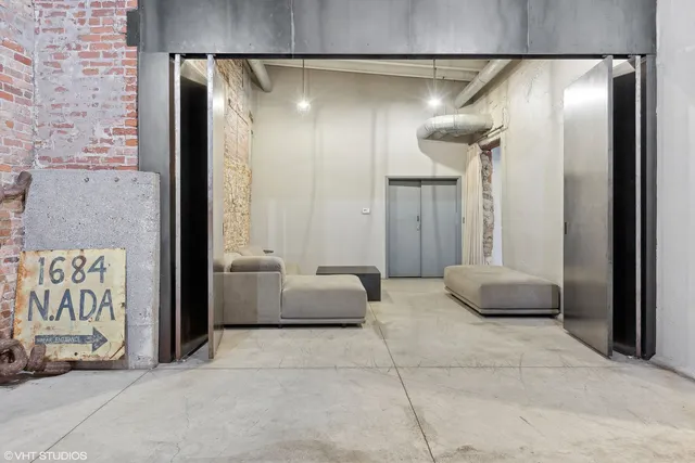 a front view of a building with large windows