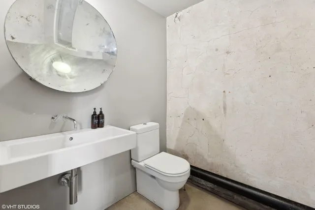 a view of a hall with wooden floor