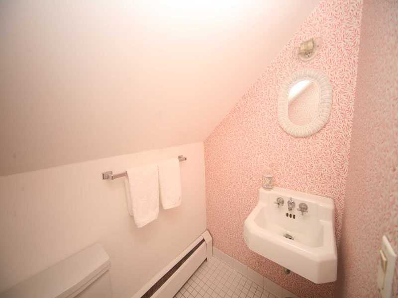 42 Walmsley Road Darien, CT 06820 - Photo 14 of 21 a bathroom with a bathtub