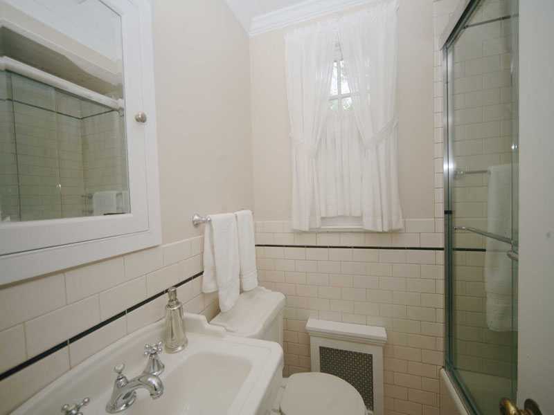 42 Walmsley Road Darien, CT 06820 - Photo 17 of 21 a bathroom with a sink and a toilet