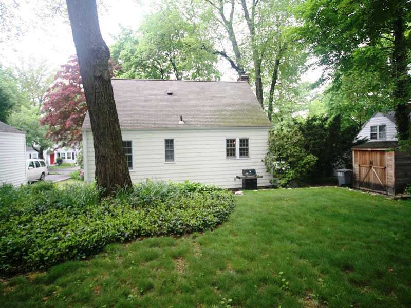 42 Walmsley Road Darien, CT 06820 - Photo 21 of 21 a view of a house with backyard and garden