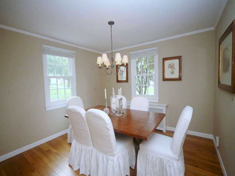 42 Walmsley Road Darien, CT 06820 - Photo 5 of 21 a view of a dining room with furniture window and wooden floor