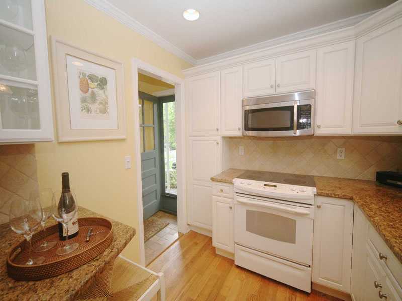42 Walmsley Road Darien, CT 06820 - Photo 9 of 21 a kitchen with a stove and a microwave