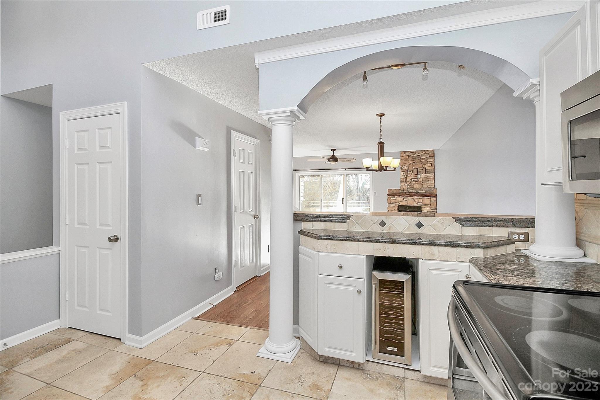 13932 Queens Harbor Road Charlotte, NC 28278 - Photo 19 of 42 a kitchen with stainless steel appliances granite countertop a stove and a sink