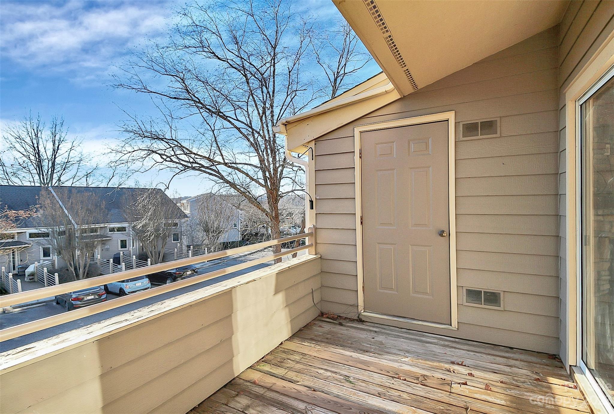 13932 Queens Harbor Road Charlotte, NC 28278 - Photo 32 of 42 a view of a house with a large window