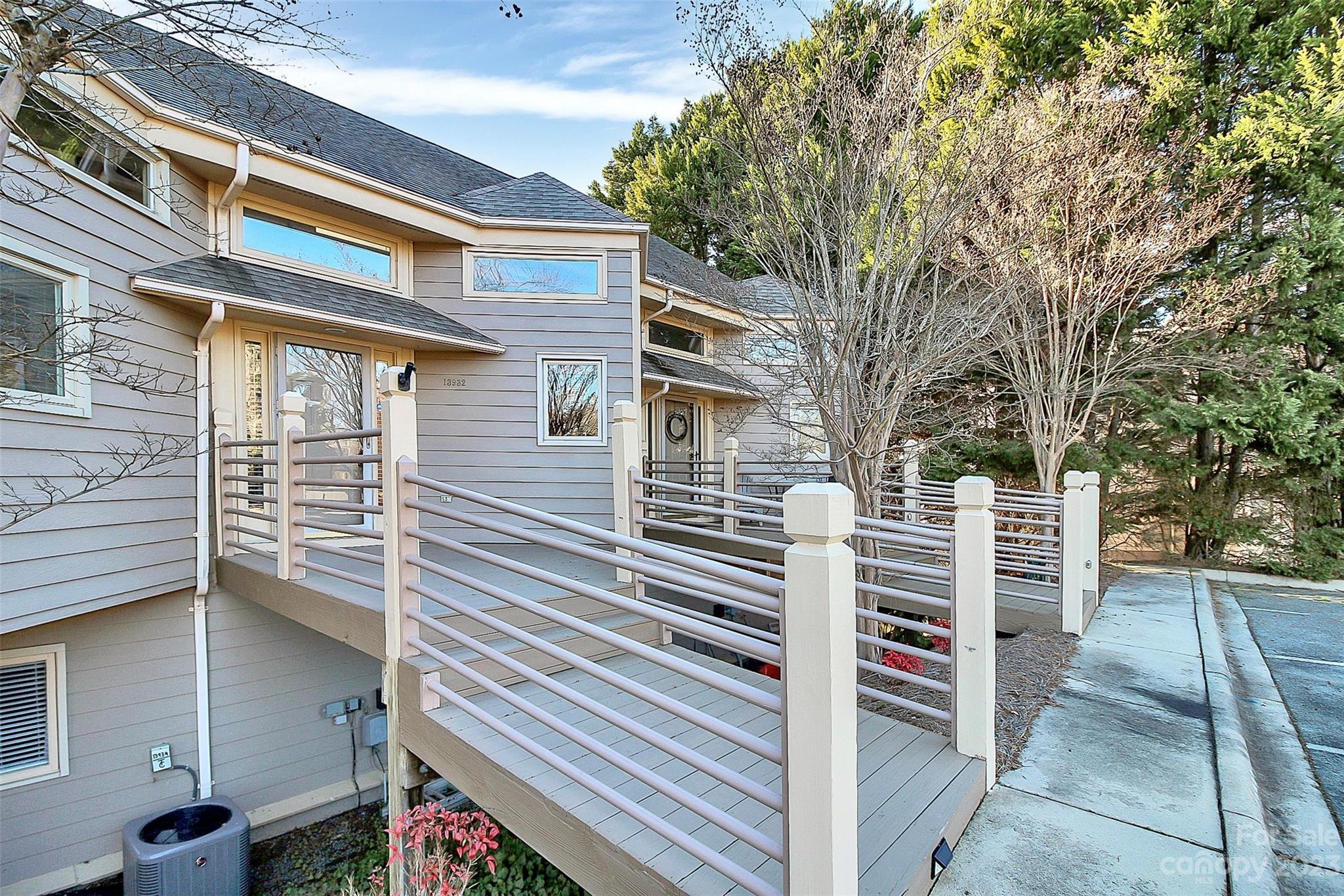 13932 Queens Harbor Road Charlotte, NC 28278 - Photo 5 of 42 a view of outdoor space deck and kitchen