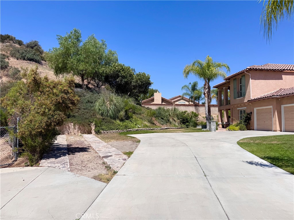 28463 Cascade Road Castaic, CA 91384 - Photo 2 of 29 a view of a street with a building in the background