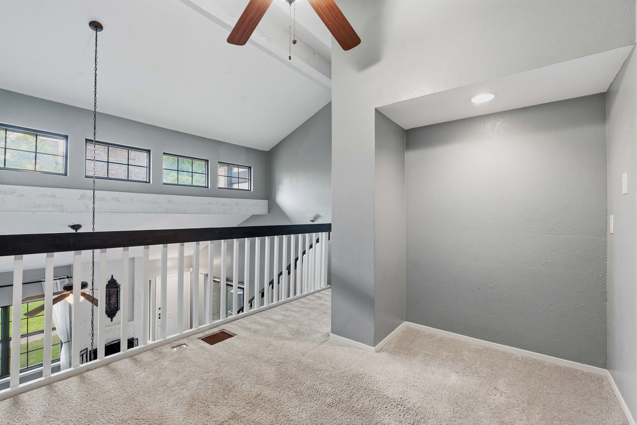 1748 Ohlen Road, Unit 24 Austin, TX 78757 - Photo 13 of 30 a view of an empty room with a window