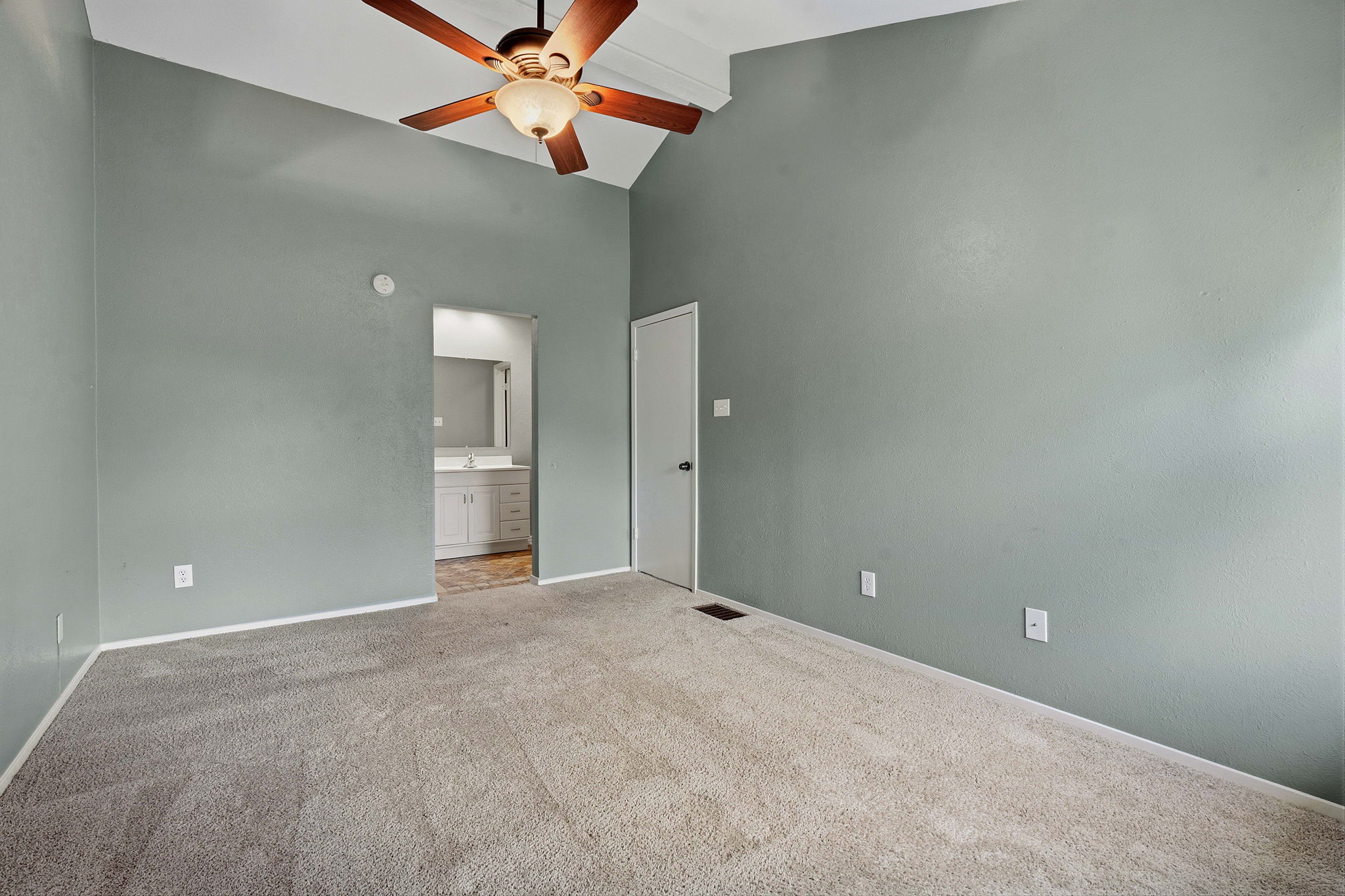 1748 Ohlen Road, Unit 24 Austin, TX 78757 - Photo 21 of 30 a view of an empty room and a ceiling fan