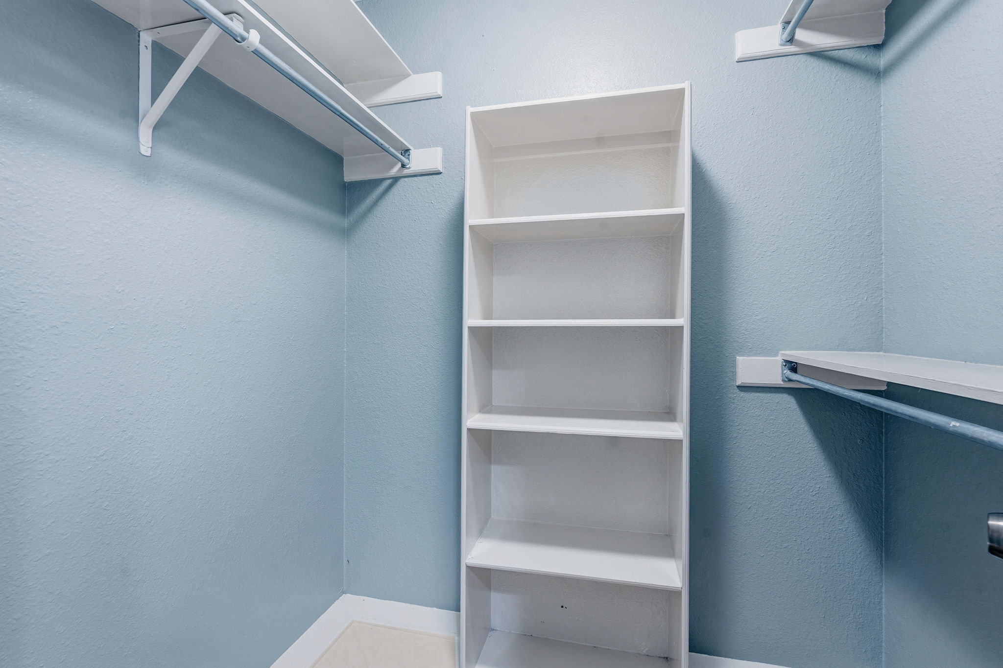1748 Ohlen Road, Unit 24 Austin, TX 78757 - Photo 23 of 30 a view of an empty walk in closet