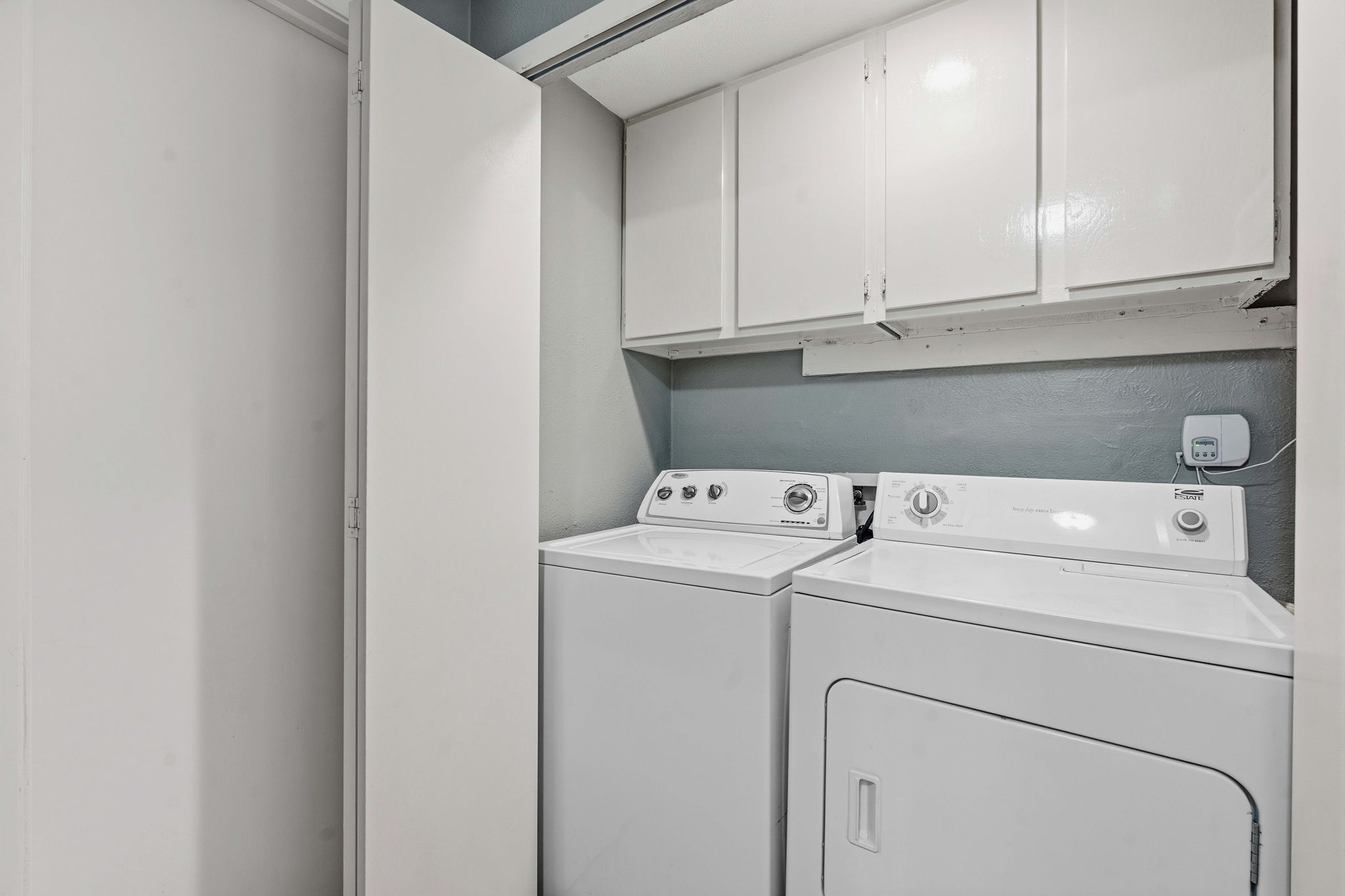 1748 Ohlen Road, Unit 24 Austin, TX 78757 - Photo 24 of 30 a utility room with dryer and washer