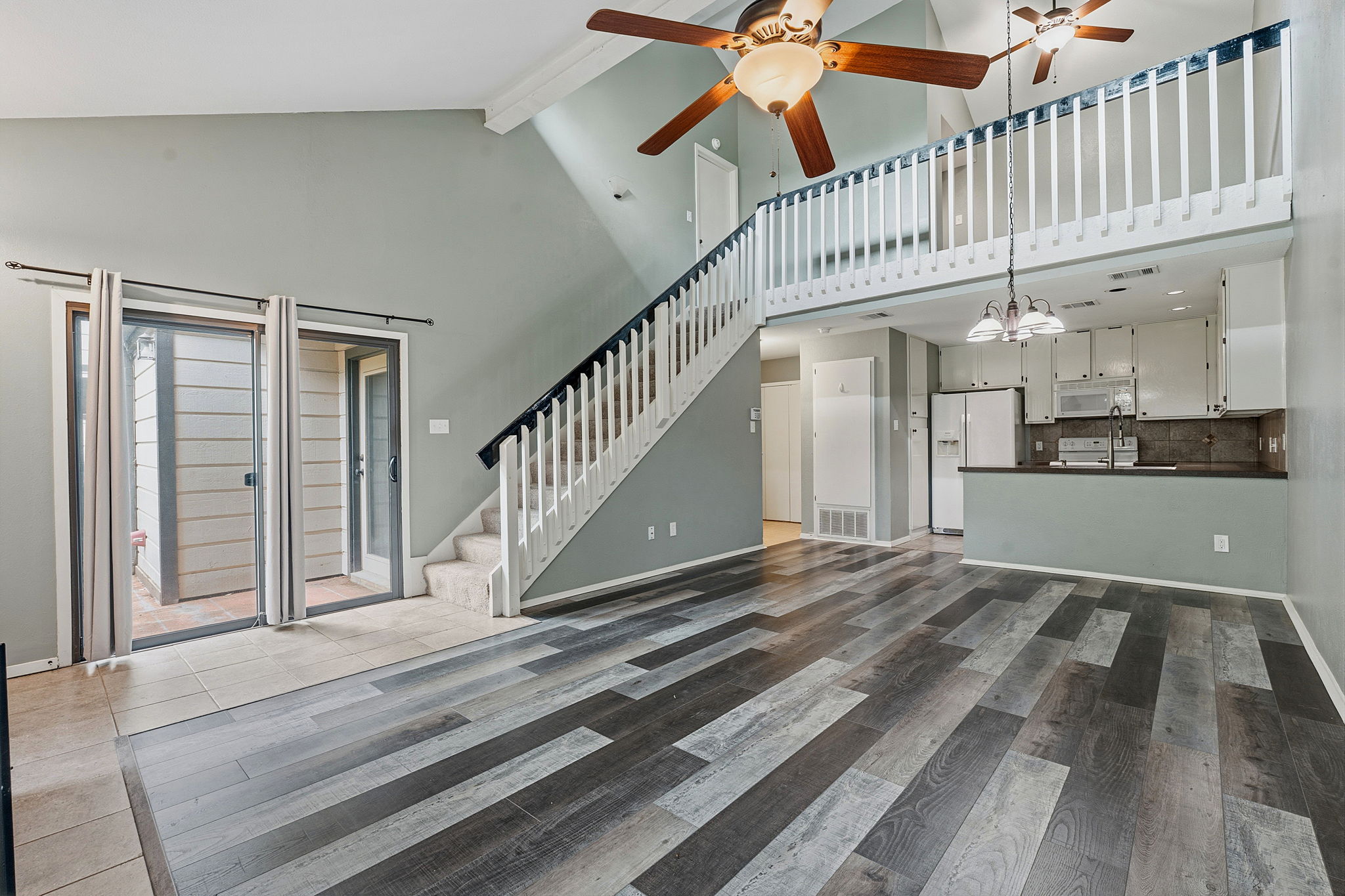 1748 Ohlen Road, Unit 24 Austin, TX 78757 - Photo 8 of 30 a view of entryway and hall with wooden floor