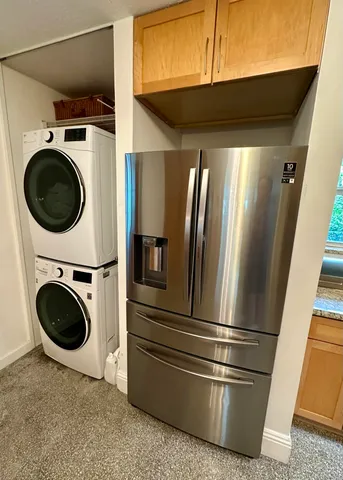 a bathroom with a granite countertop sink mirror and double