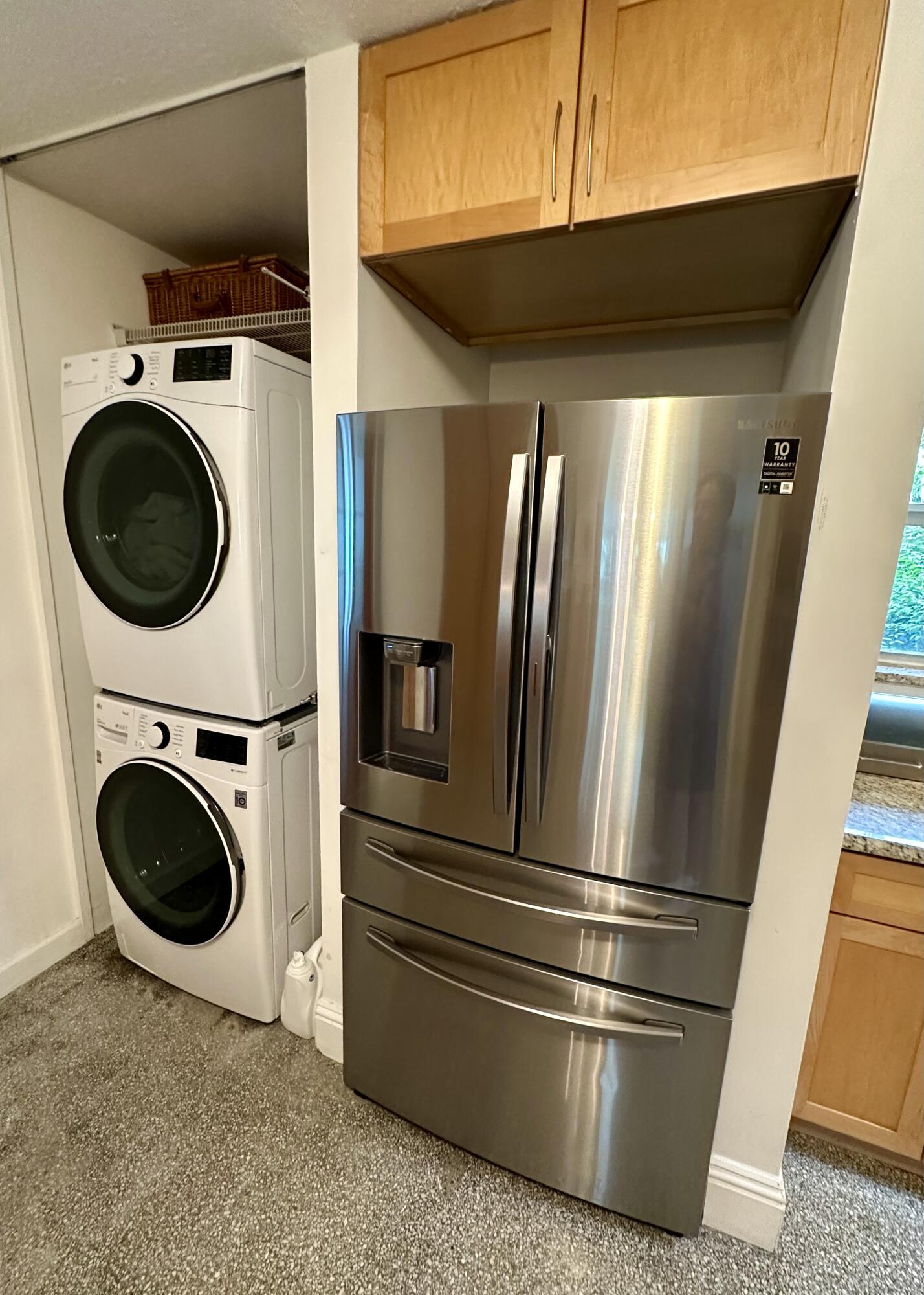 212 Kings Lynn Delray Beach, FL 33444 - Photo 23 of 53 a view of a refrigerator with washer and dryer
