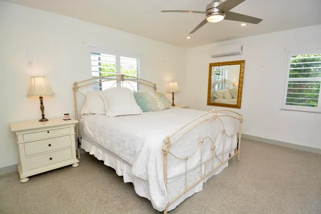 a bathroom with a toilet and shower