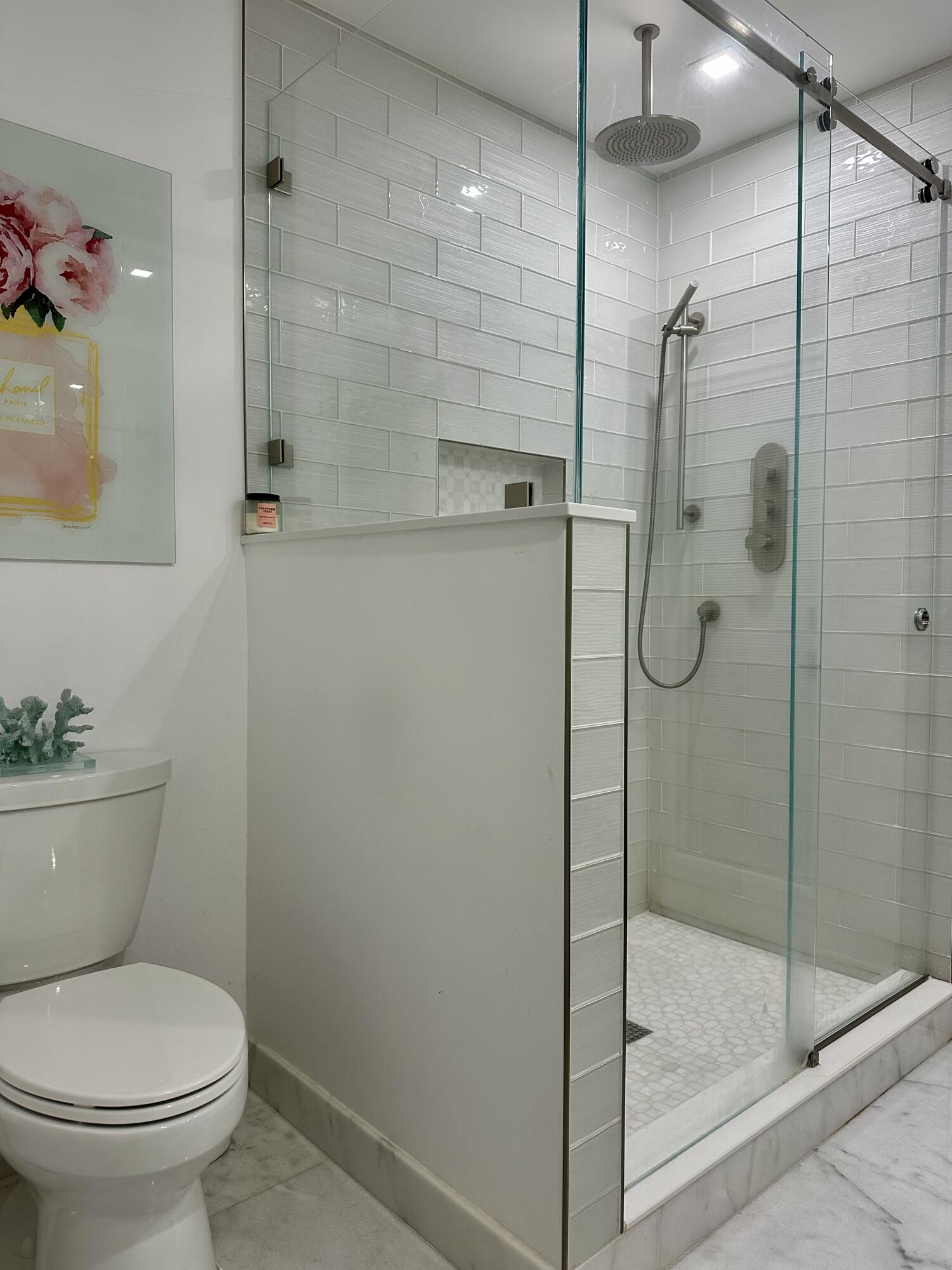 212 Kings Lynn Delray Beach, FL 33444 - Photo 27 of 53 a bathroom with a toilet and shower