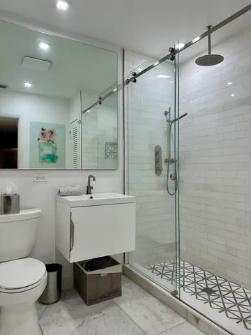 a view of a house with backyard sitting area and garden