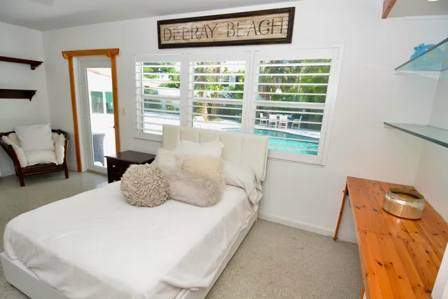 a view of a chairs and table on the terrace