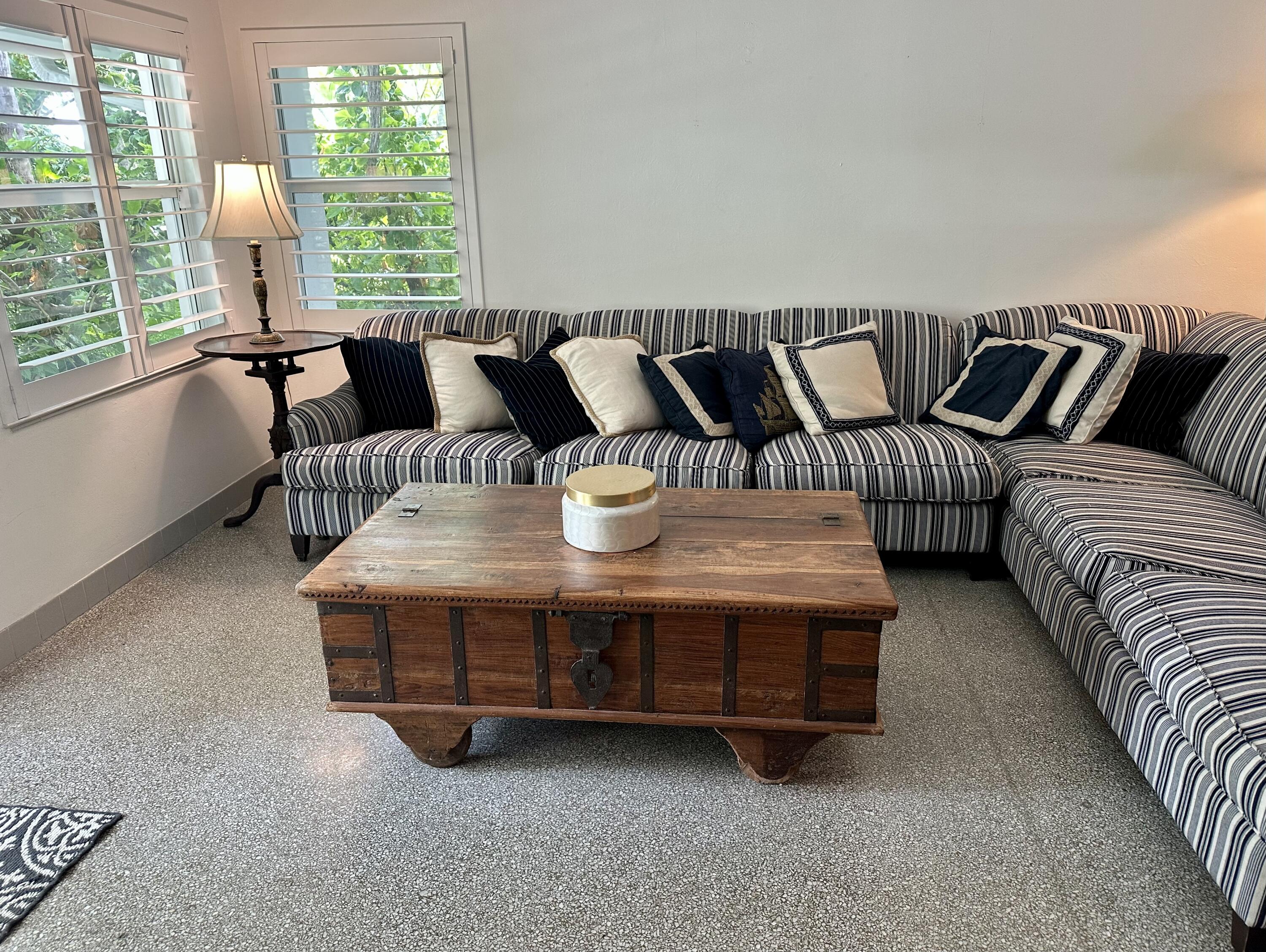 212 Kings Lynn Delray Beach, FL 33444 - Photo 8 of 53 a living room with furniture and large windows