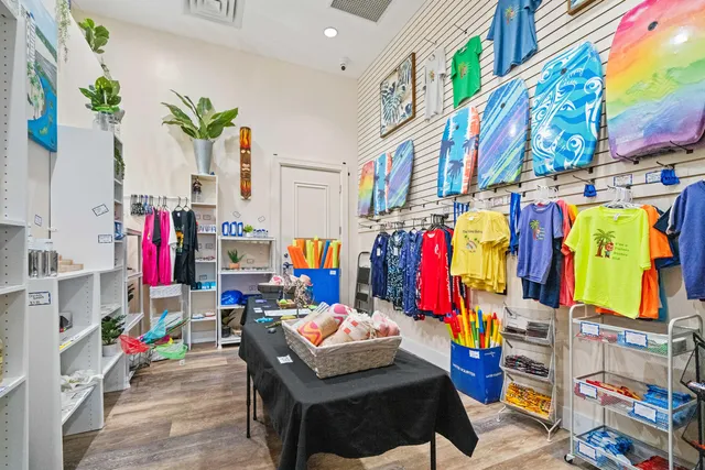 a living room filled with furniture and a table