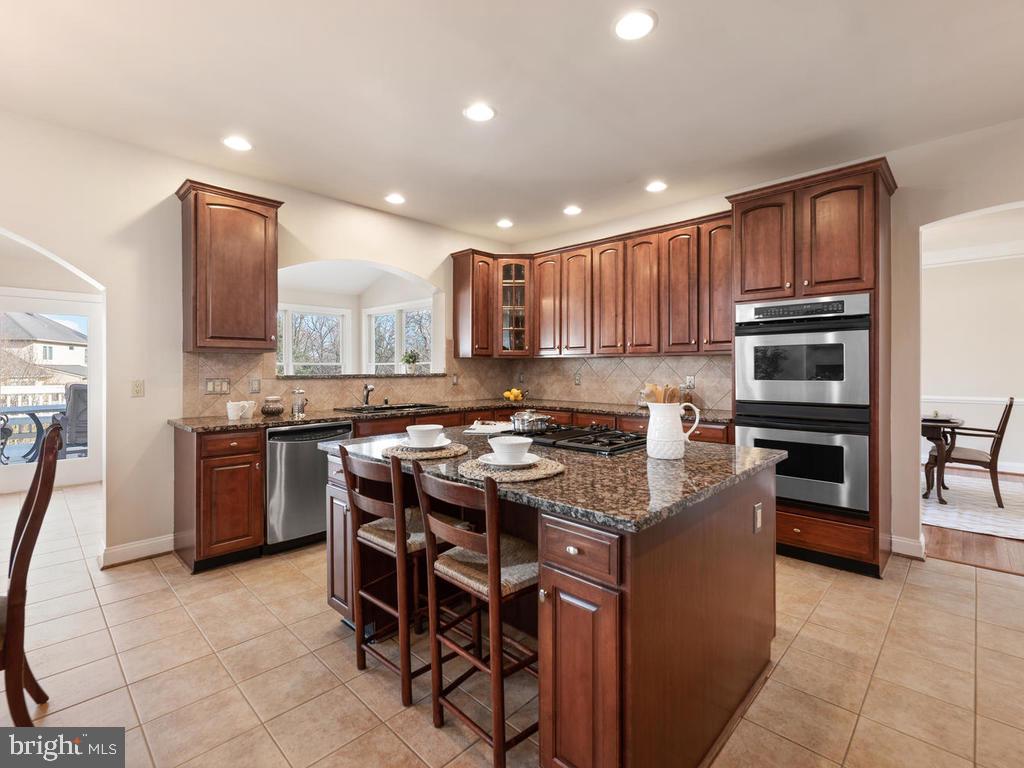 12128 Sheets Farm Road North Potomac, MD 20878 - Photo 16 of 54 Big island kitchen