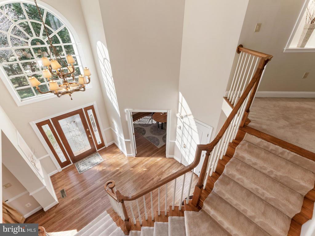 12128 Sheets Farm Road North Potomac, MD 20878 - Photo 21 of 54 Turned staircase overlooking foyer