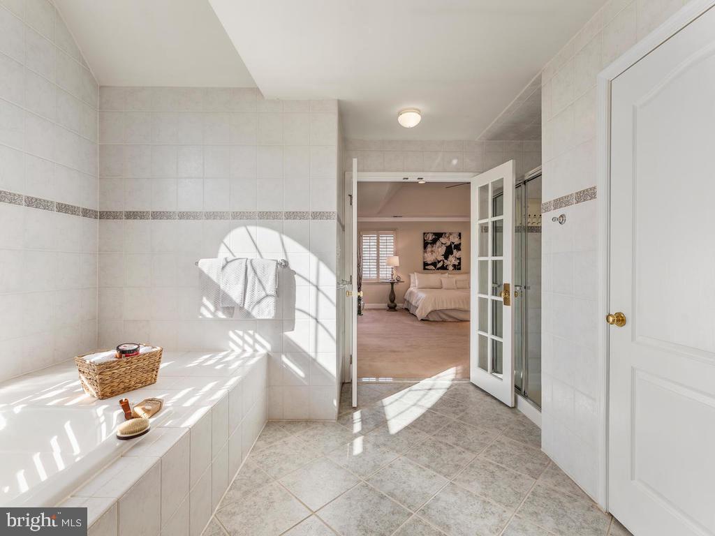 12128 Sheets Farm Road North Potomac, MD 20878 - Photo 27 of 54 Full tile walls