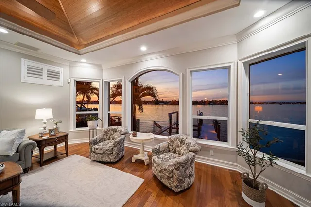 a bedroom with furniture and a fireplace
