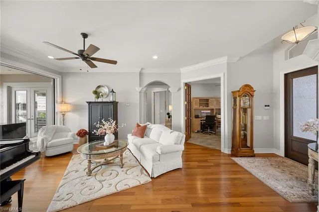 a large kitchen with a table and chairs