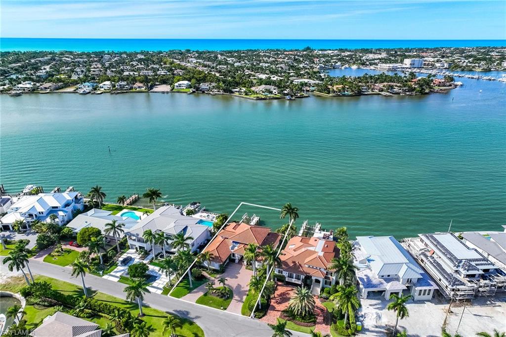 1942 Kingfish Road Naples, FL 34102 - Photo 3 of 50 a view of a city and ocean view