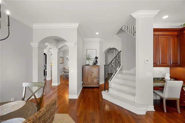 a bathroom with a bathtub sink and mirror