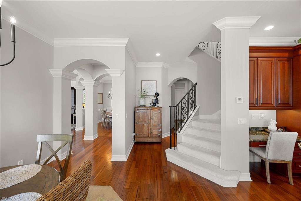 1942 Kingfish Road Naples, FL 34102 - Photo 29 of 50 a view of entryway and hall with wooden floor