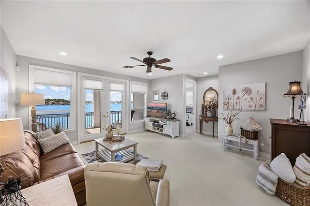 a workspace with furniture window and a ceiling fan