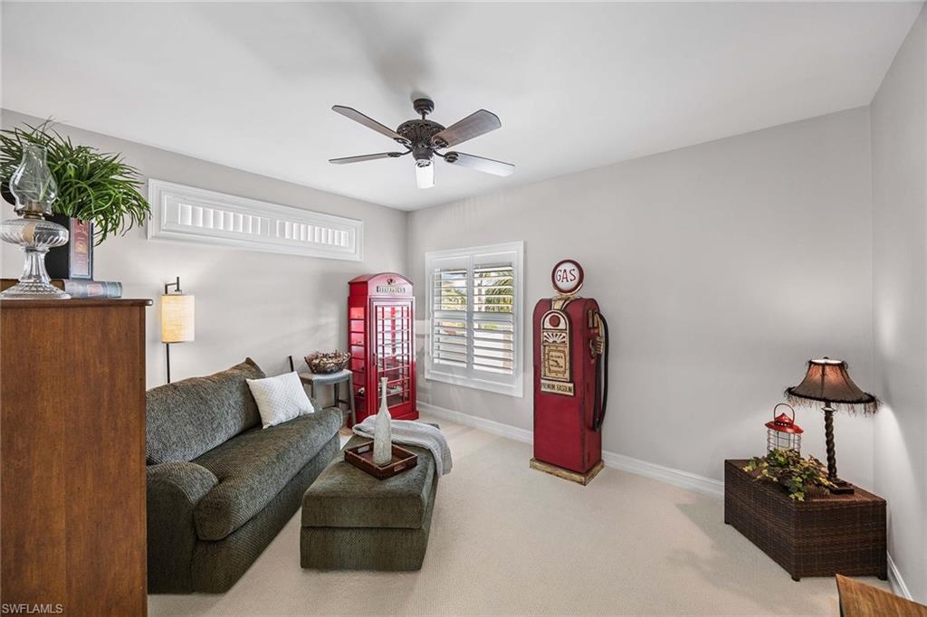 1942 Kingfish Road Naples, FL 34102 - Photo 38 of 50 a living room with furniture