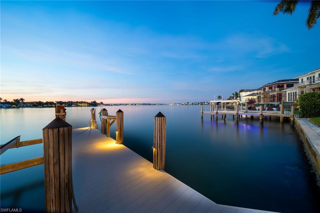 1942 Kingfish Road Naples, FL 34102 - Photo 40 of 50 a view of a lake