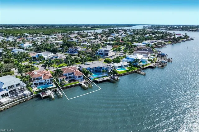 a view of a lake from a hallway