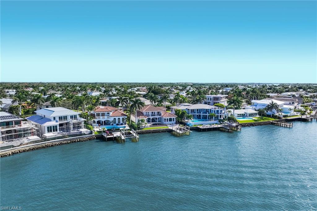 1942 Kingfish Road Naples, FL 34102 - Photo 43 of 50 a view of a lake view