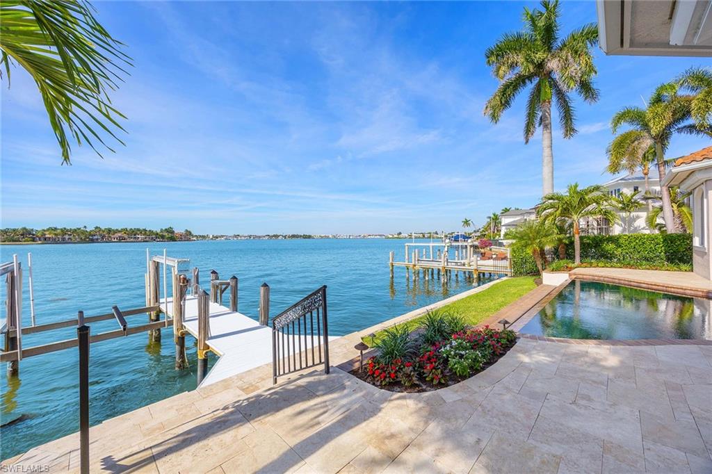 1942 Kingfish Road Naples, FL 34102 - Photo 46 of 50 a view of a balcony with lake view