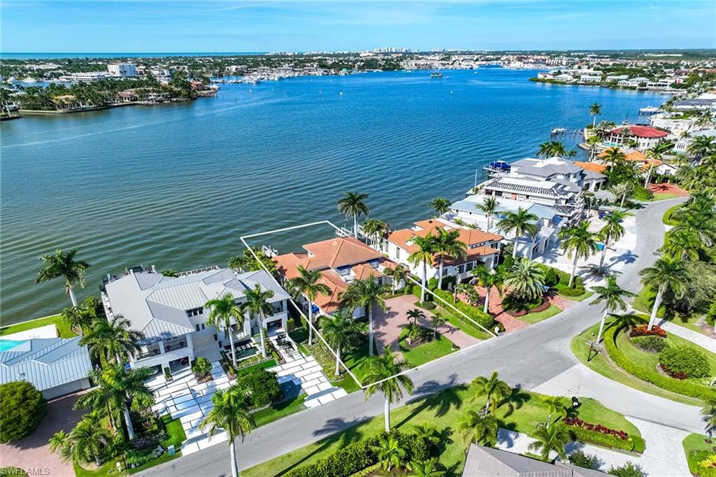 1942 Kingfish Road Naples, FL 34102 - Photo 8 of 50 an aerial view of ocean with residential house with outdoor space